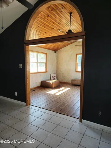 a view of a swimming pool with a yard