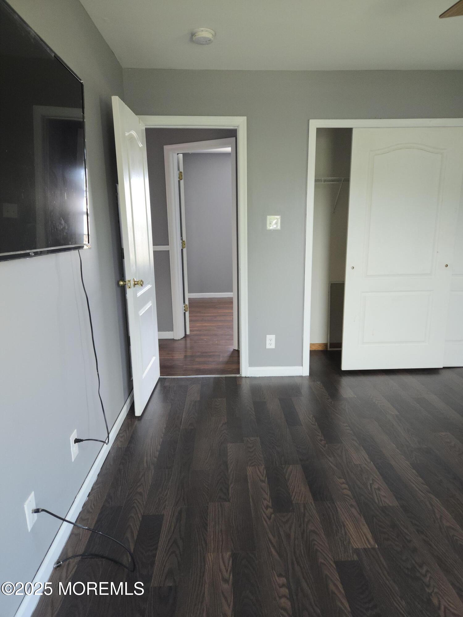 34 Vance Avenue Sicklerville, NJ 08081 - Photo 23 of 30 wooden floor in a hall with an empty room