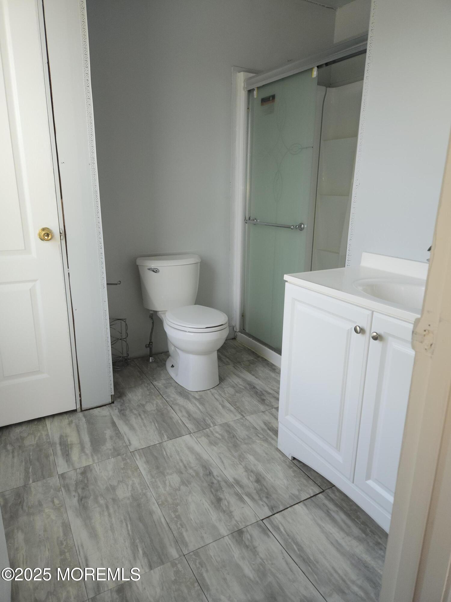 34 Vance Avenue Sicklerville, NJ 08081 - Photo 24 of 30 a white toilet sitting next to a sink