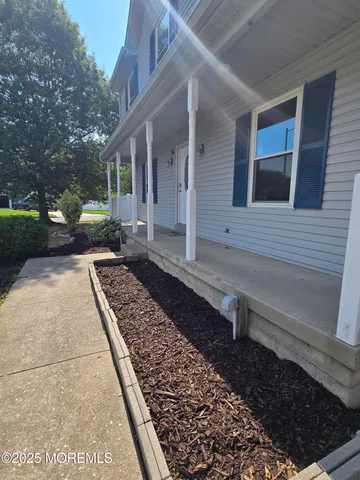 a view of a back yard of the house