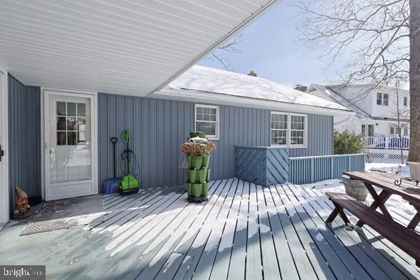 a view of a backyard with sitting area