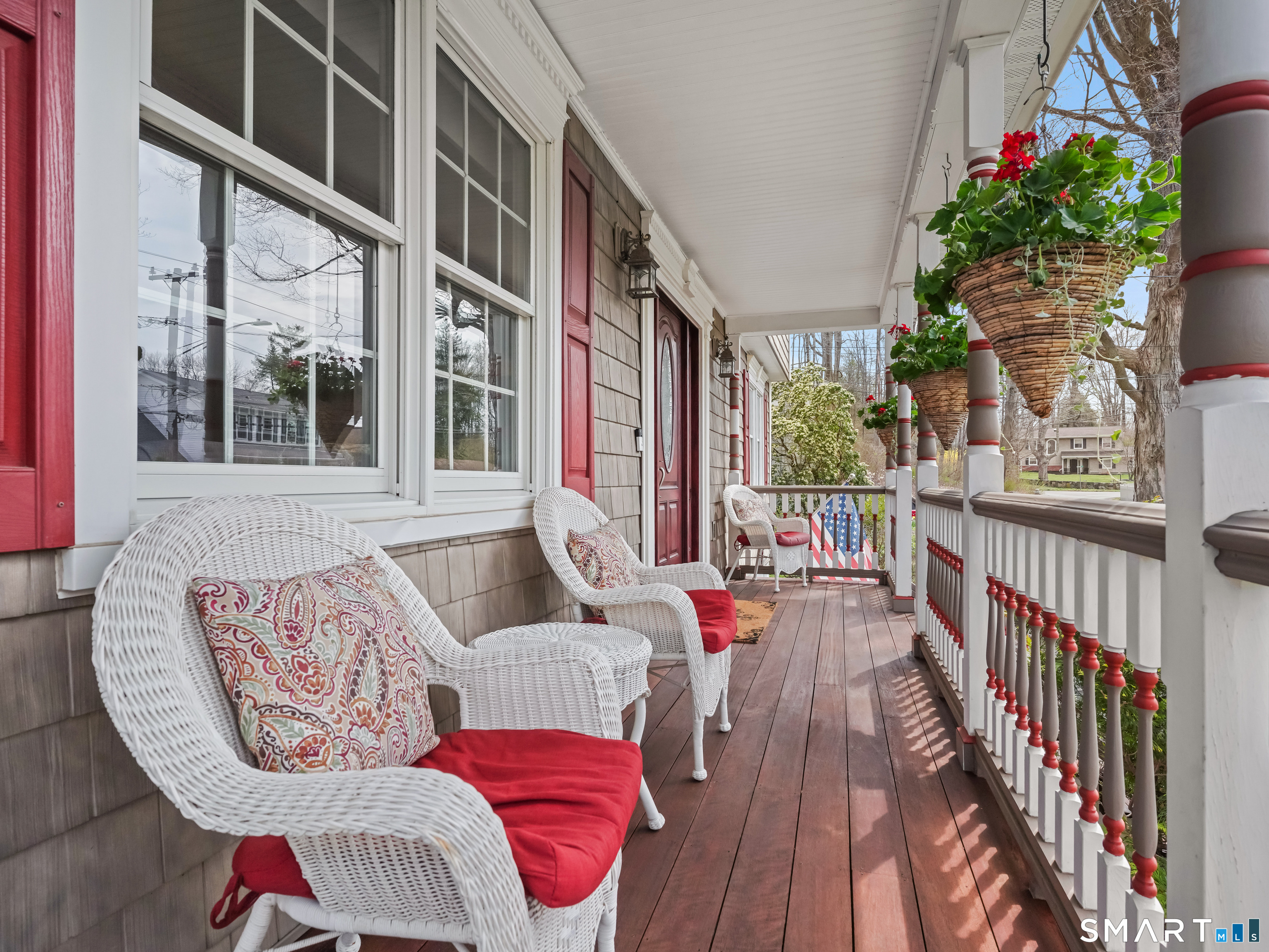 82 Ramapoo Road Ridgefield, CT 06877 - Photo 3 of 40 a balcony with furniture and a potted plant