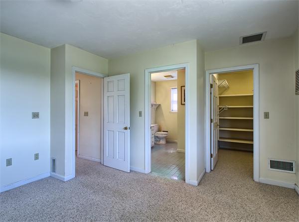 32 Surfside Road Scituate, MA 02066 - Photo 12 of 18 a view of a room with a wardrobe space