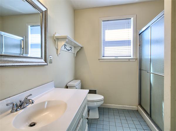32 Surfside Road Scituate, MA 02066 - Photo 14 of 18 a bathroom with a sink and a toilet
