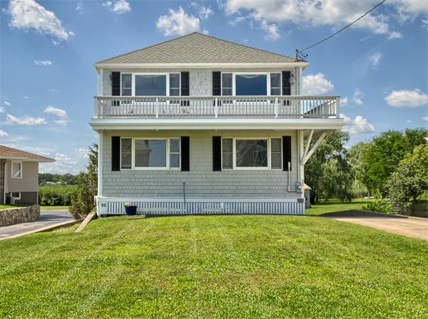 32 Surfside Road Scituate, MA 02066 - Photo 16 of 18 a front view of a house with a yard