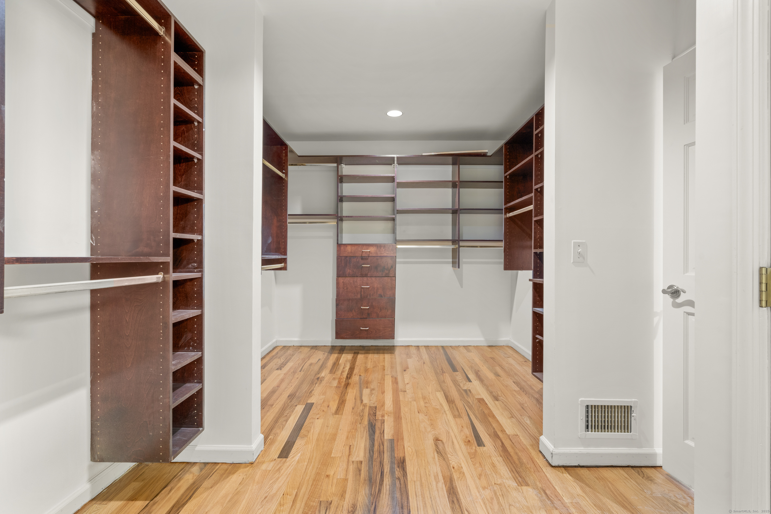 181 Old Boston Road Wilton, CT 06897 - Photo 16 of 30 a view of wooden floor in a room
