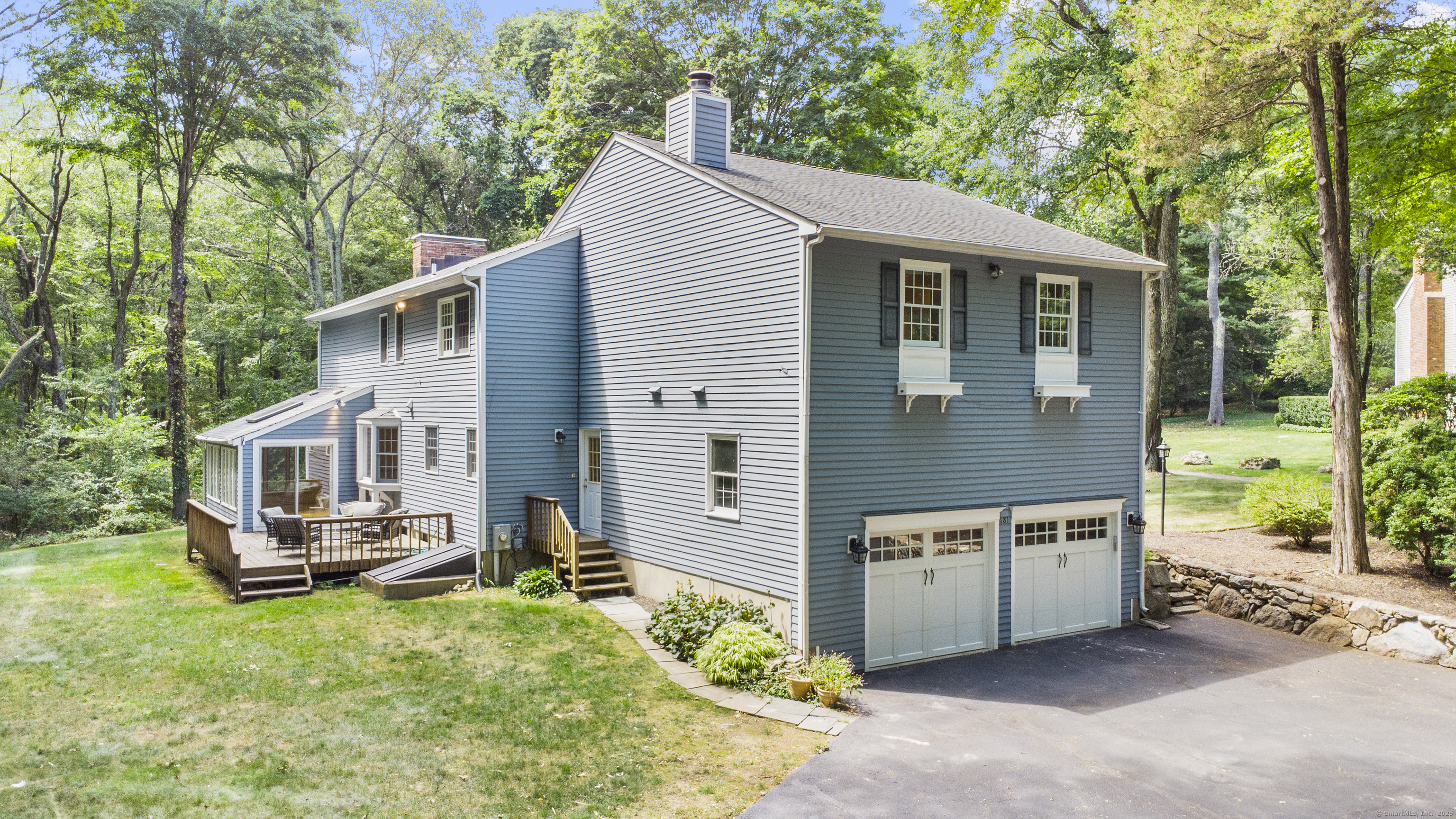 181 Old Boston Road Wilton, CT 06897 - Photo 25 of 30 a view of a house with backyard and sitting area