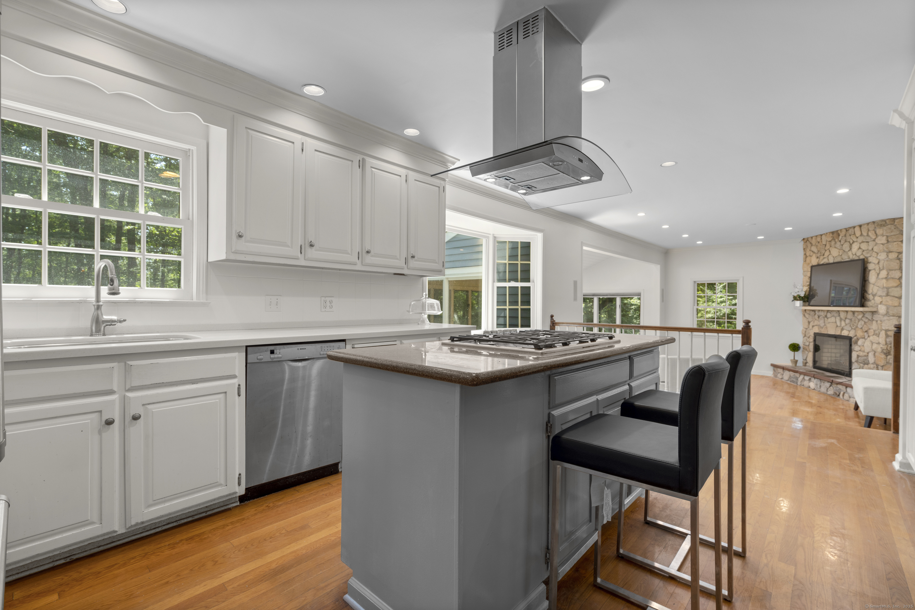181 Old Boston Road Wilton, CT 06897 - Photo 8 of 30 a kitchen with a sink cabinets and window