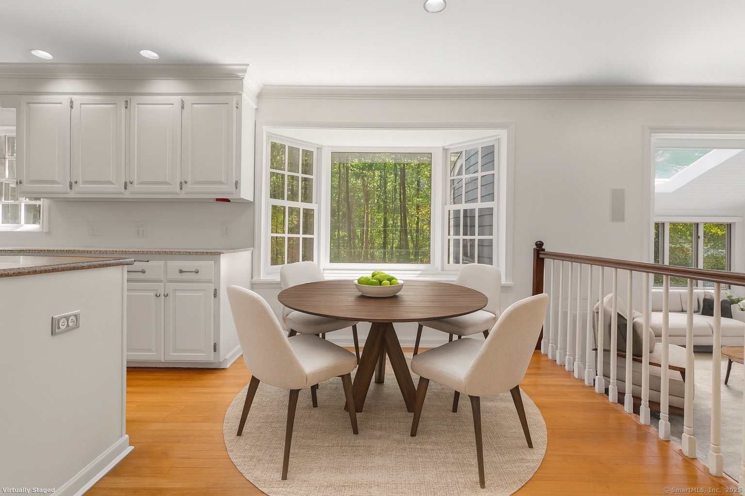 181 Old Boston Road Wilton, CT 06897 - Photo 9 of 30 a view of a dining room with furniture and wooden floor