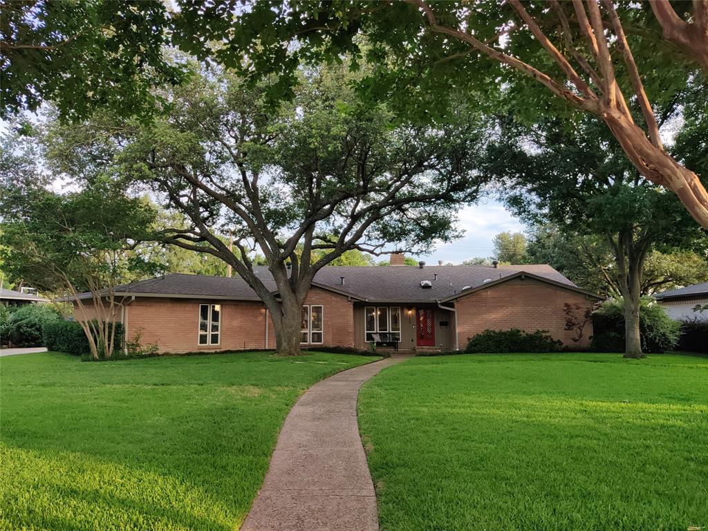 4532 Ridgeside Drive Dallas, TX 75244 - Photo 1 of 1 Elegant ranch-style home set gracefully back from the street, nestled among mature trees and beautifully landscaped grounds.