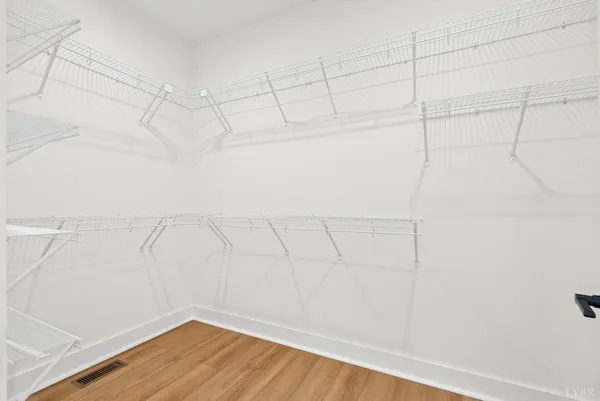 a view of a room with racks on the wall