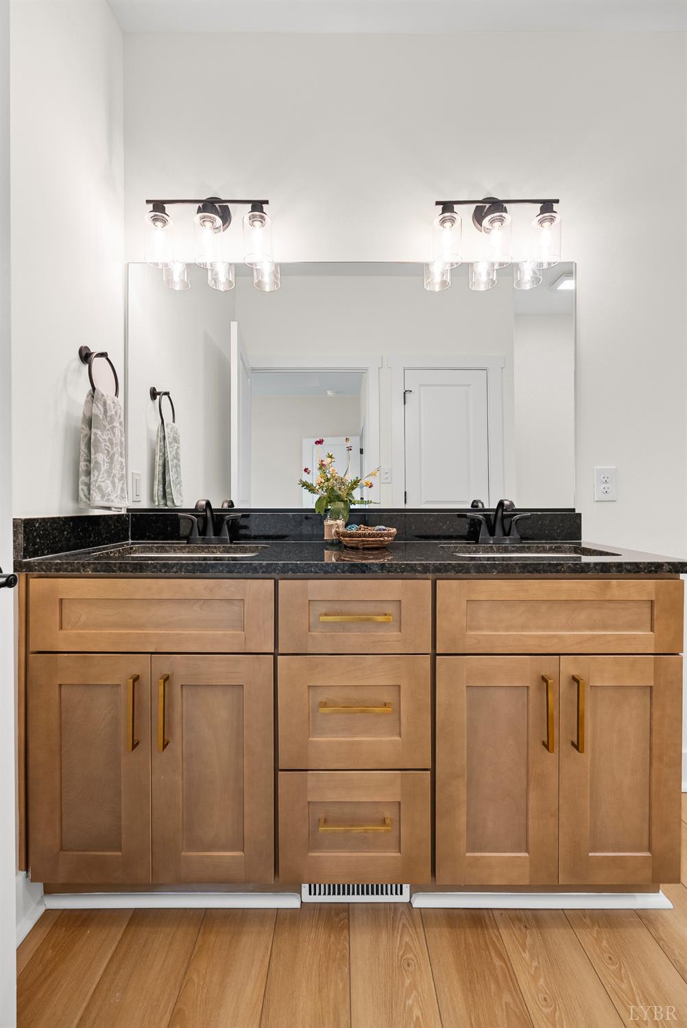 187 Fox Hall Drive Amherst, VA 24521 - Photo 25 of 36 a bathroom with a sink and a mirror