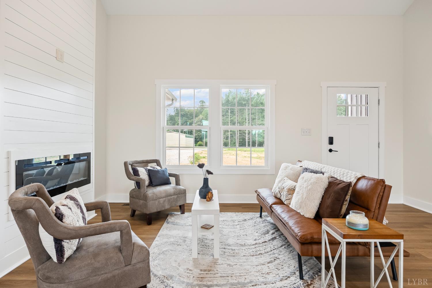187 Fox Hall Drive Amherst, VA 24521 - Photo 3 of 36 a living room with furniture and a floor to ceiling window