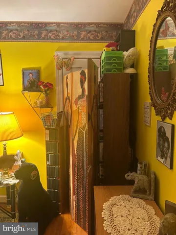 a bathroom with a granite countertop shower and a mirror