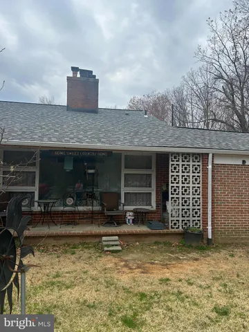 a front view of a house with swimming pool