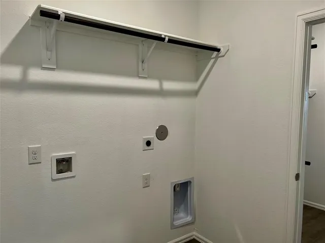 a bathroom with a sink toilet and a bathtub