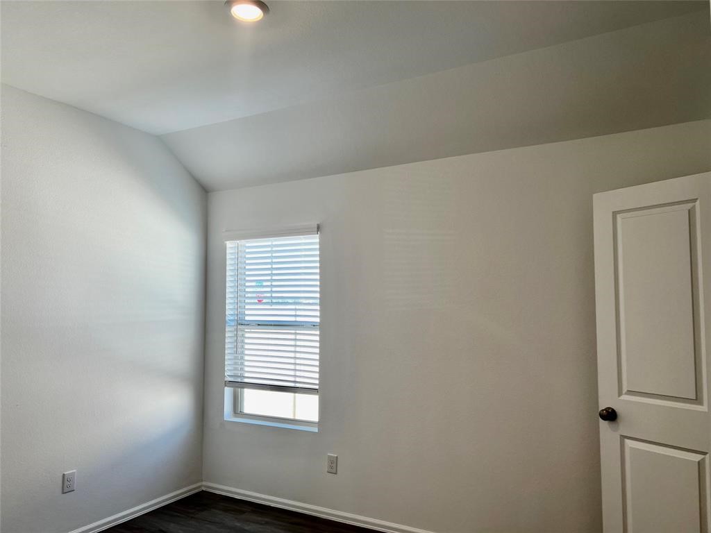 5304 Winding Strm Drive Rosenberg, TX 77469 - Photo 13 of 17 an empty room with windows