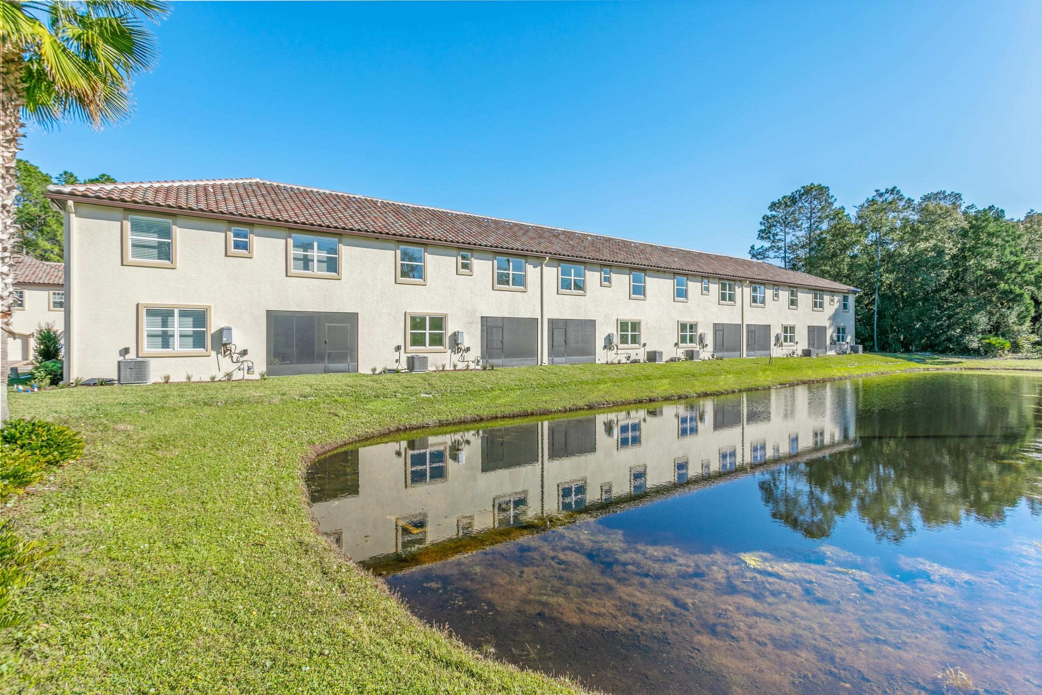 241 Grand Ravine Drive St. Augustine, FL 32086 - Photo 1 of 37 a view of a house with a yard