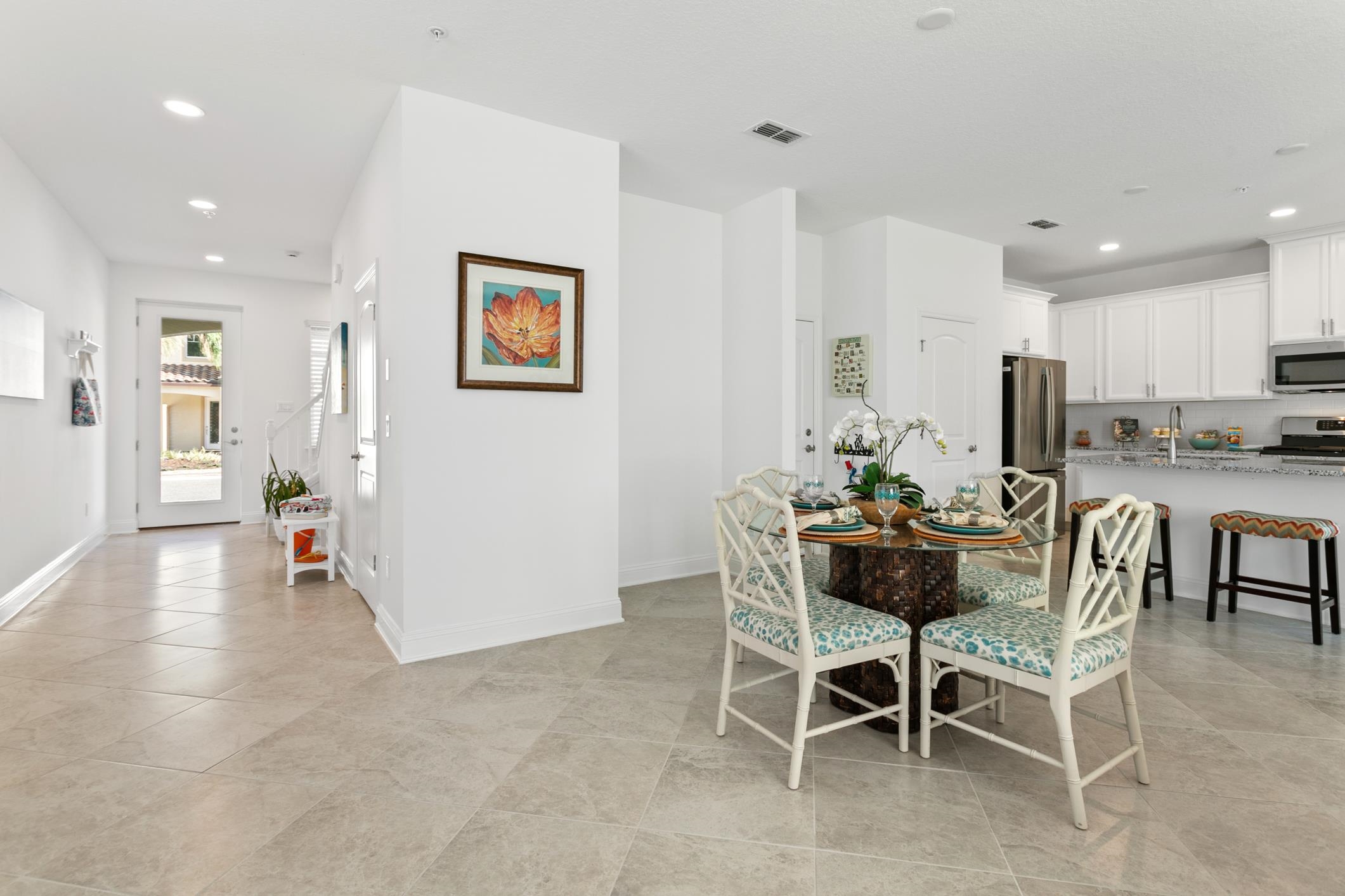 241 Grand Ravine Drive St. Augustine, FL 32086 - Photo 11 of 37 a view of a dining room with furniture