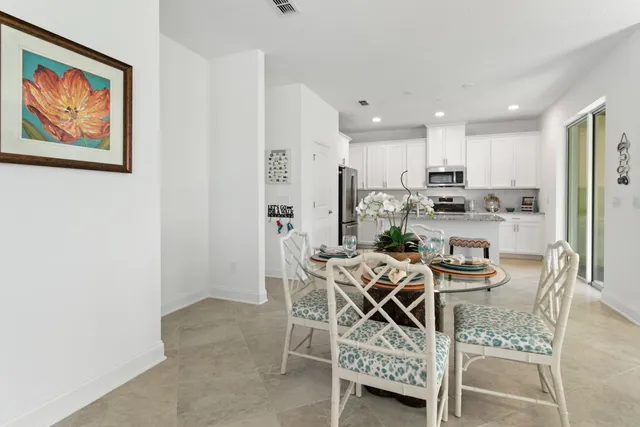 a view of a dining room with furniture