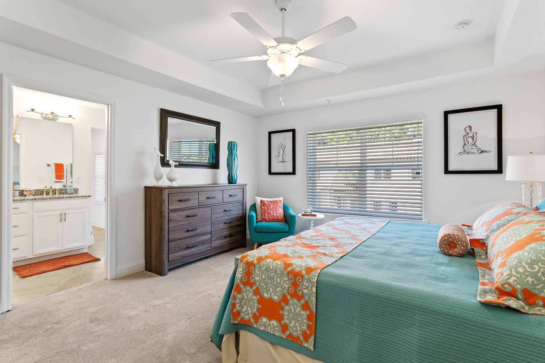 241 Grand Ravine Drive St. Augustine, FL 32086 - Photo 25 of 37 a bedroom with a bed and a cabinets