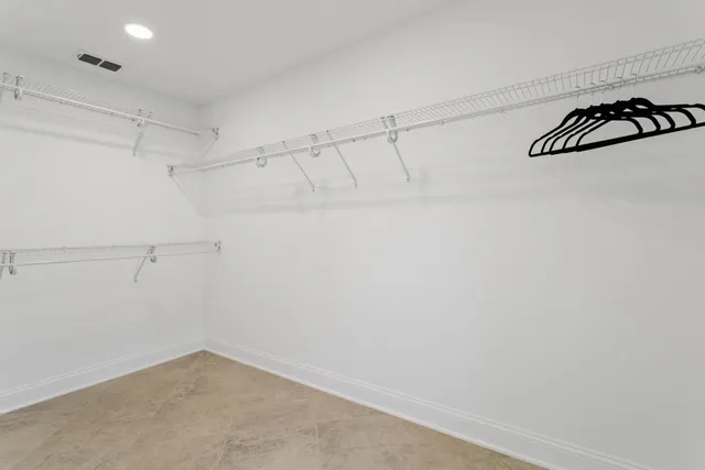 a view of a room with racks on the wall