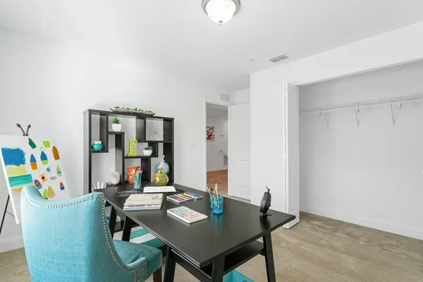 a view of a dining room with furniture