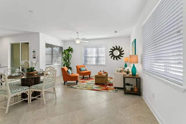 a living room filled with furniture gym equipment and a window