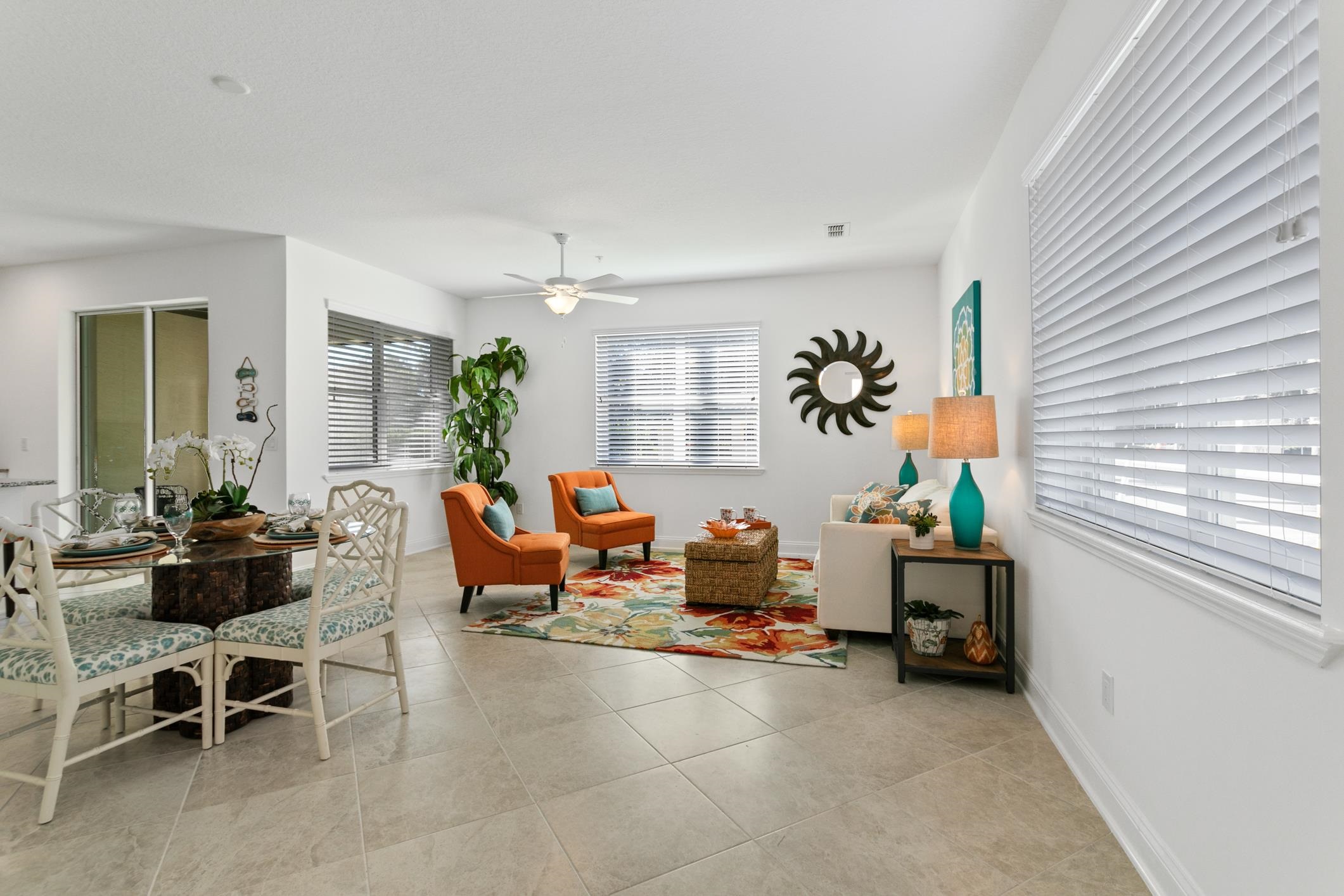 241 Grand Ravine Drive St. Augustine, FL 32086 - Photo 10 of 37 a living room filled with furniture gym equipment and a window