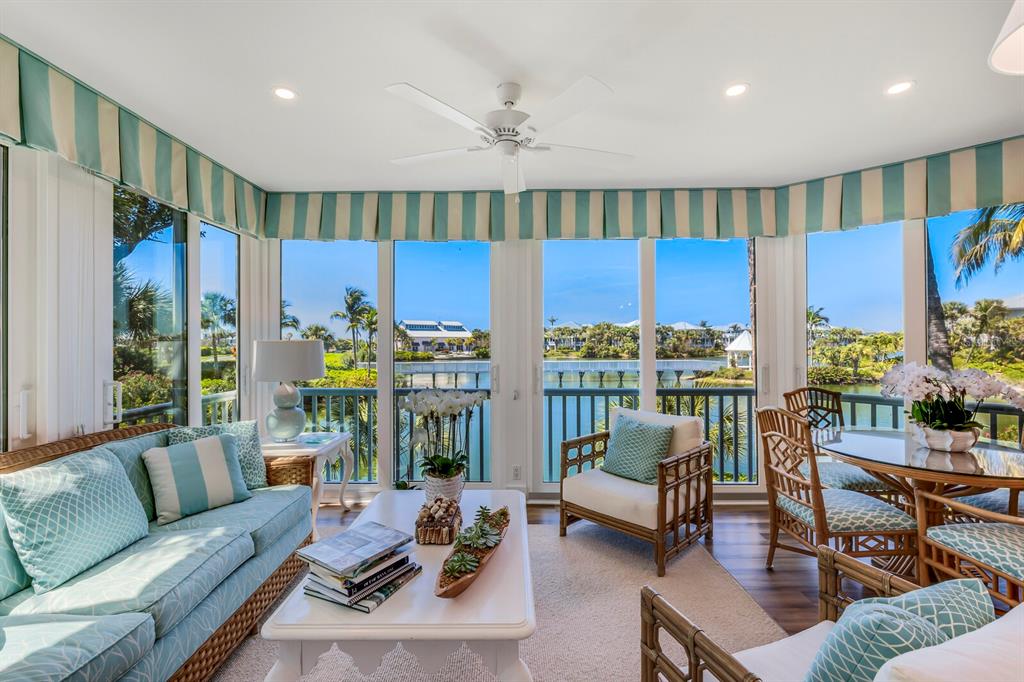 820 South Harbor Drive Boca Grande, FL 33921 - Photo 9 of 37 a living room with furniture kitchen view and a large window