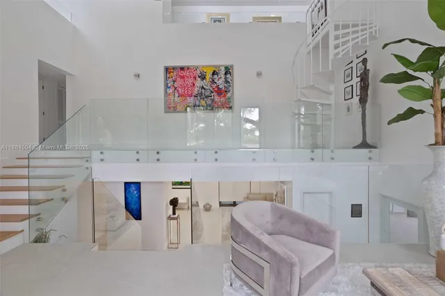 a bathroom with a sink mirror and vanity