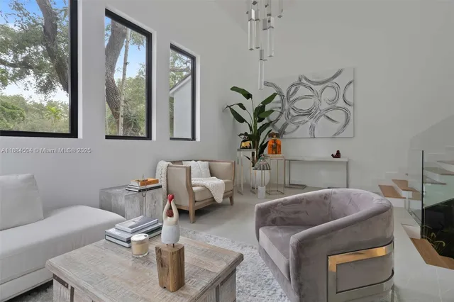 a living room with furniture and window