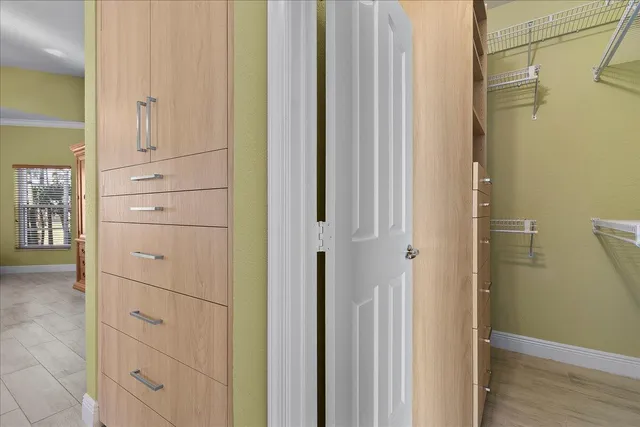 an aerial view of residential building and lake