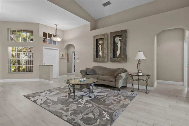 a kitchen with stainless steel appliances granite countertop a stove sink and cabinets