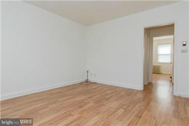2978 Cornwall Road Dundalk, MD 21222 - Photo 2 of 27 a view of a room with wooden floor