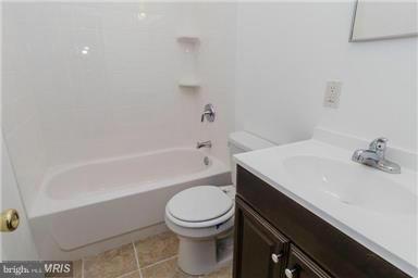 2978 Cornwall Road Dundalk, MD 21222 - Photo 11 of 27 a bathroom with a sink a toilet and bathtub