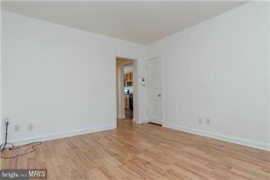 2978 Cornwall Road Dundalk, MD 21222 - Photo 3 of 27 wooden floor in an empty room