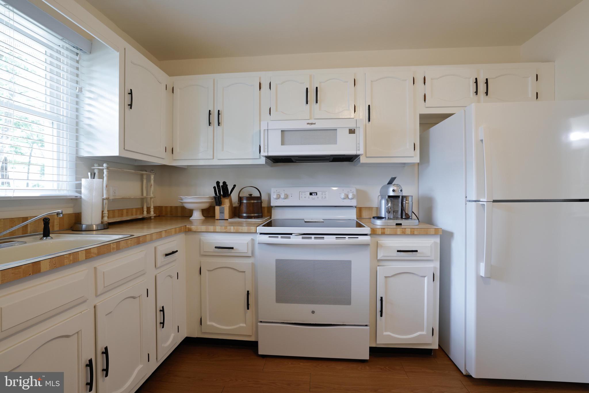14 A Magnolia Road Manahawkin, NJ 08050 - Photo 12 of 22 Bright and inviting kitchen with classic charm.