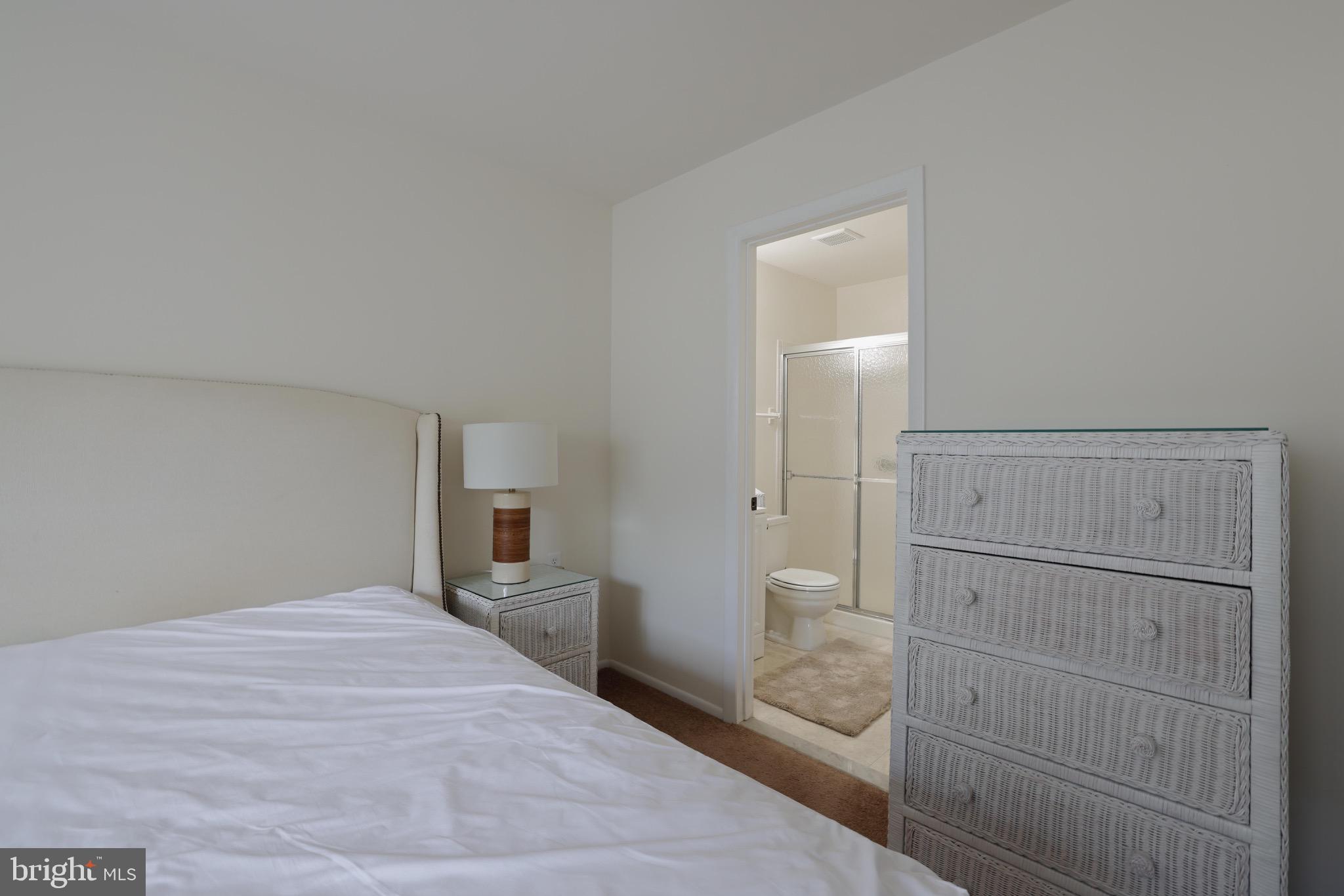 14 A Magnolia Road Manahawkin, NJ 08050 - Photo 16 of 22 Serene bedroom with en-suite bathroom access.