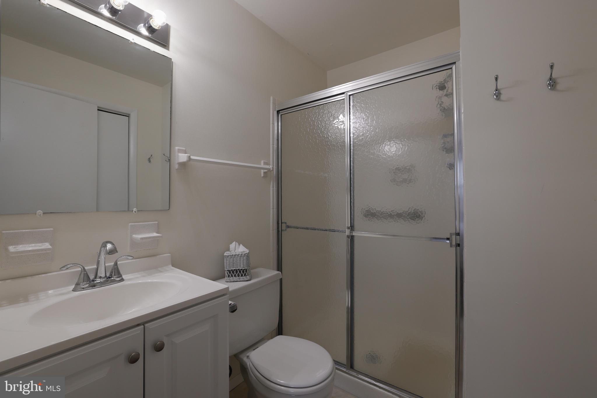 14 A Magnolia Road Manahawkin, NJ 08050 - Photo 17 of 22 Modern bathroom with sleek fixtures.