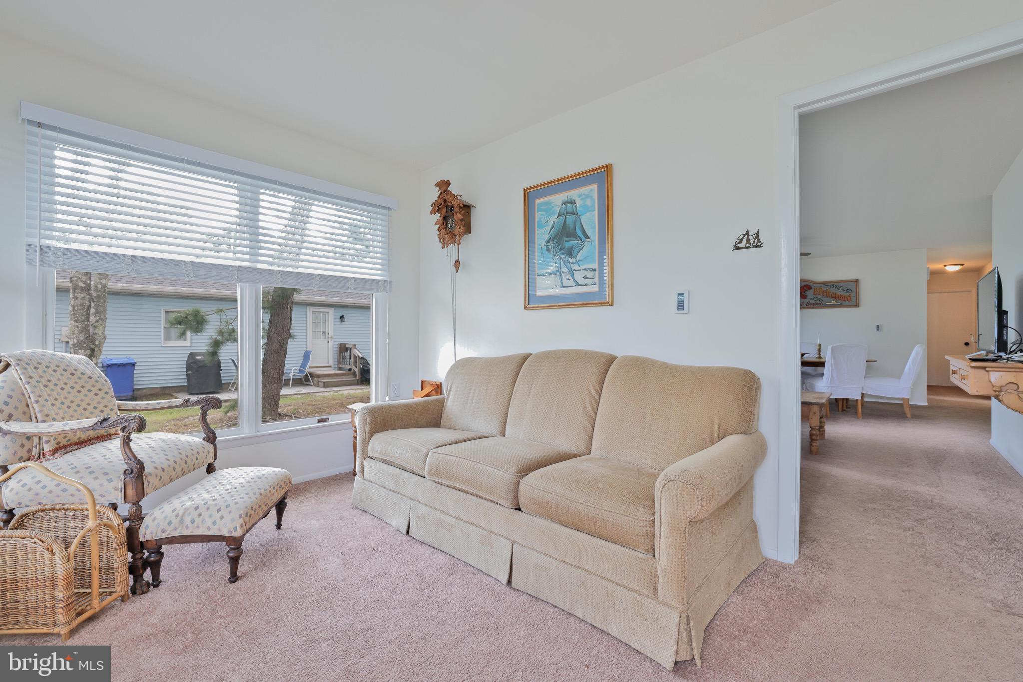 14 A Magnolia Road Manahawkin, NJ 08050 - Photo 2 of 22 Bright and inviting living space with charm.