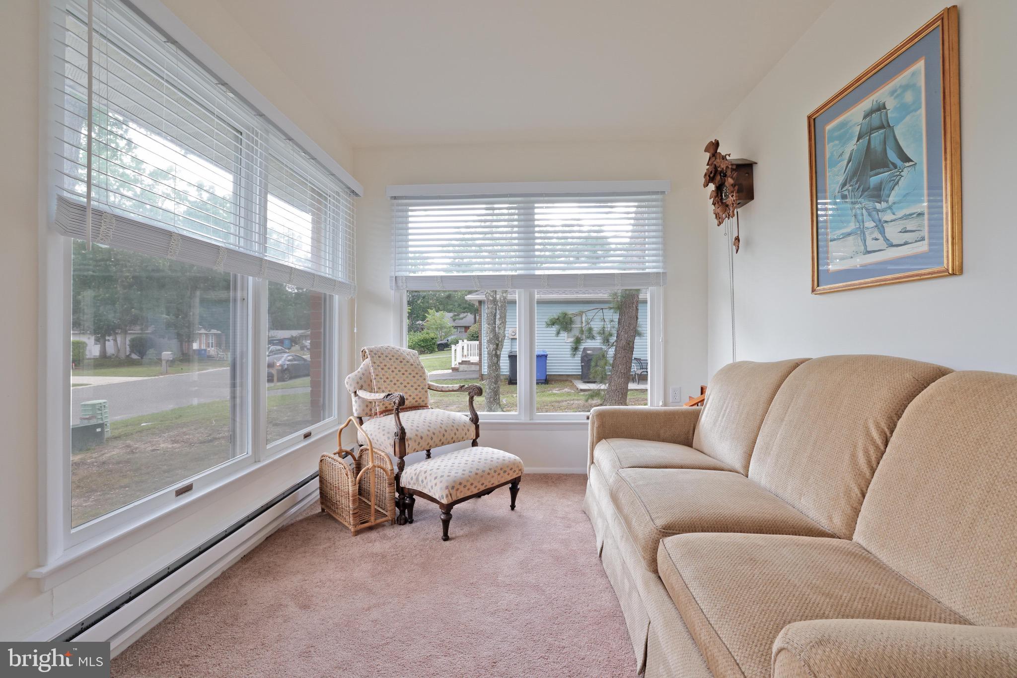 14 A Magnolia Road Manahawkin, NJ 08050 - Photo 3 of 22 Bright and inviting sunlit sitting area.