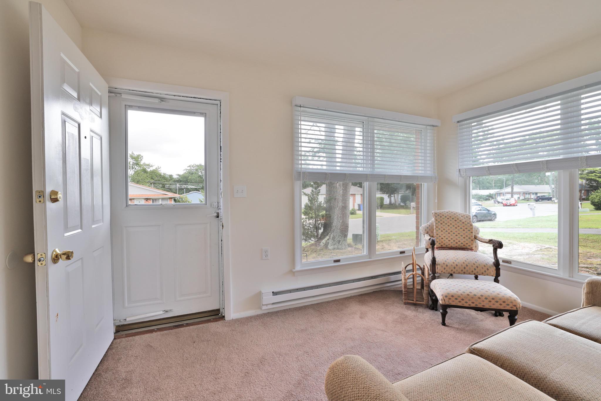 14 A Magnolia Road Manahawkin, NJ 08050 - Photo 4 of 22 Bright and inviting entryway with natural light.