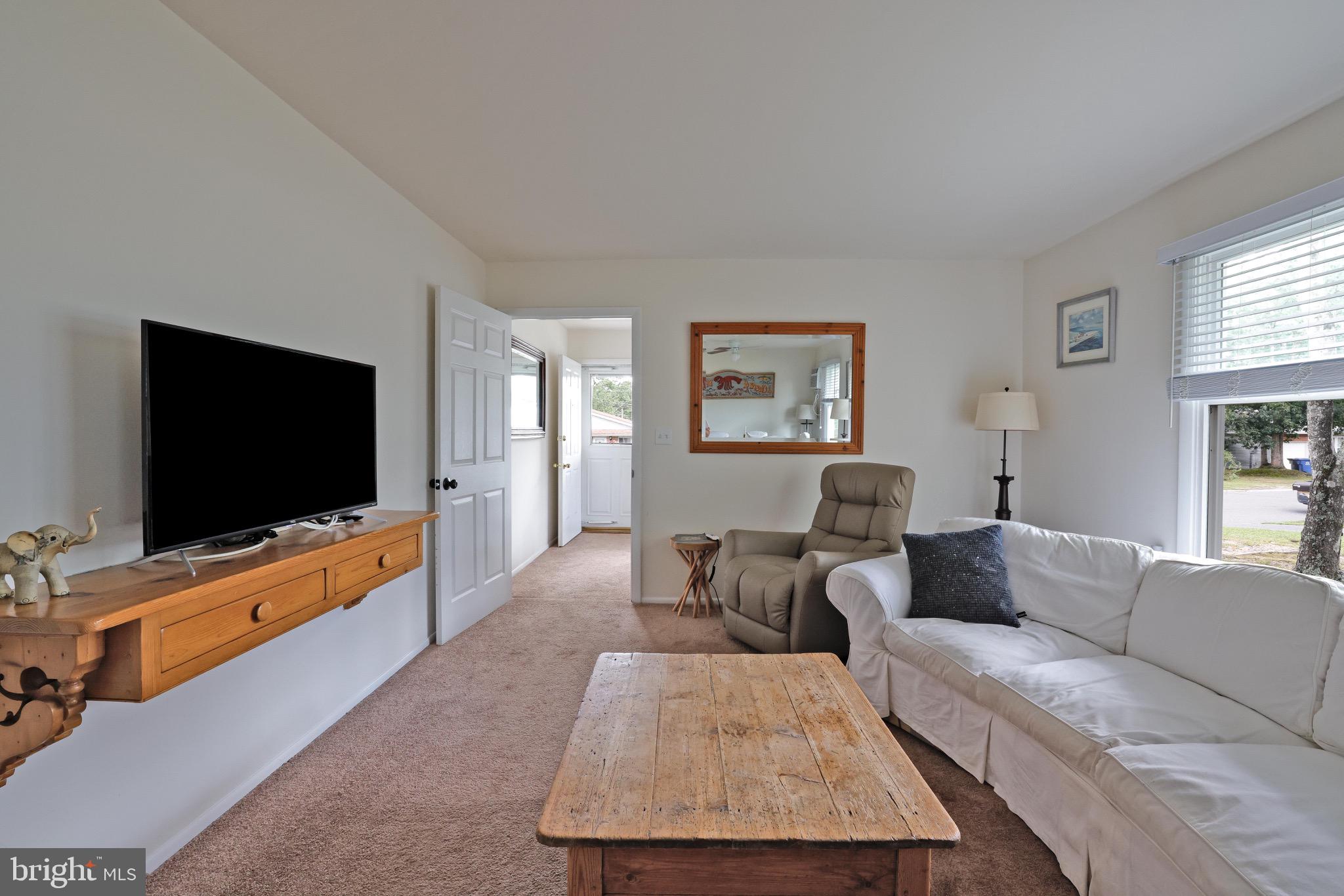 14 A Magnolia Road Manahawkin, NJ 08050 - Photo 7 of 22 Bright and inviting living space awaits you.