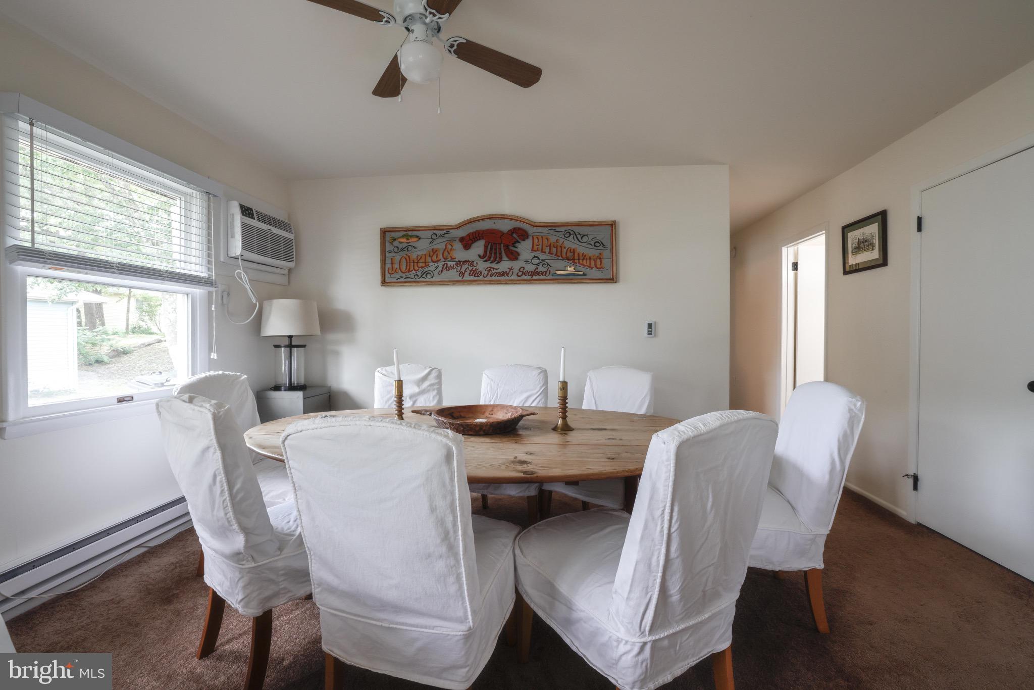 14 A Magnolia Road Manahawkin, NJ 08050 - Photo 8 of 22 Bright dining space with inviting ambiance.