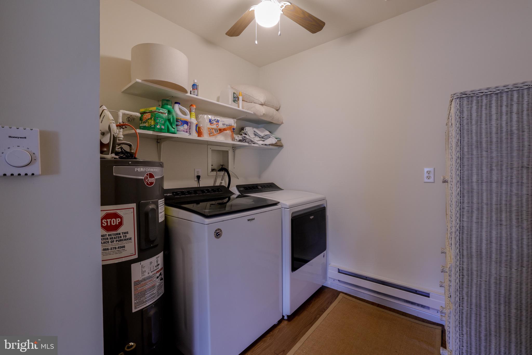 14 A Magnolia Road Manahawkin, NJ 08050 - Photo 9 of 22 Functional laundry space with ample storage.