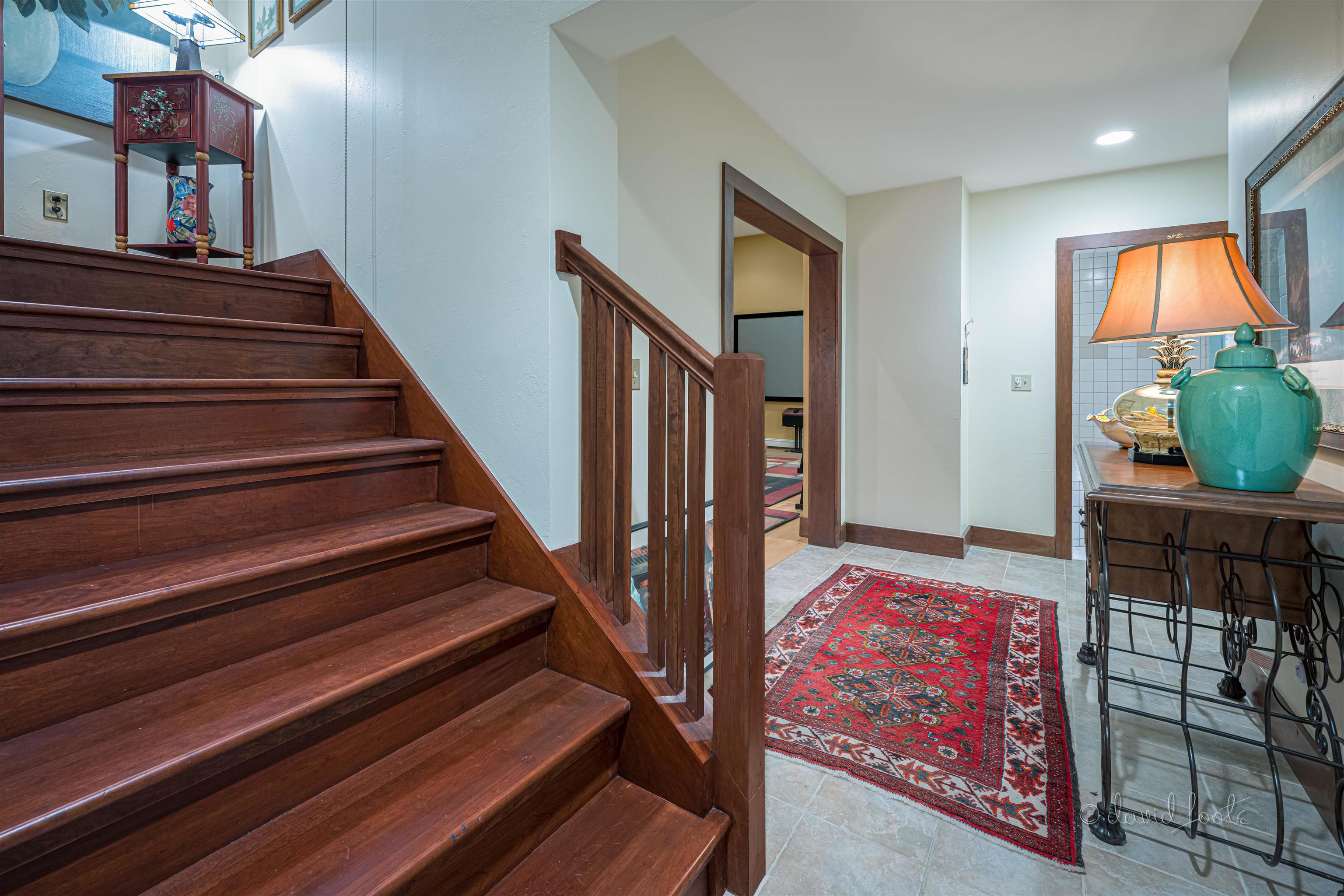 49 High Ridge Run Galena, IL 61036 - Photo 52 of 81 a view of a hallway with wooden floor and stairs