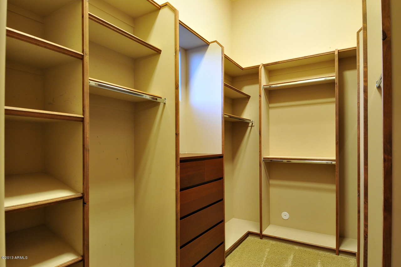 12827 East Cibola Road Scottsdale, AZ 85259 - Photo 34 of 64 a bathroom with a glass door shower and a sink