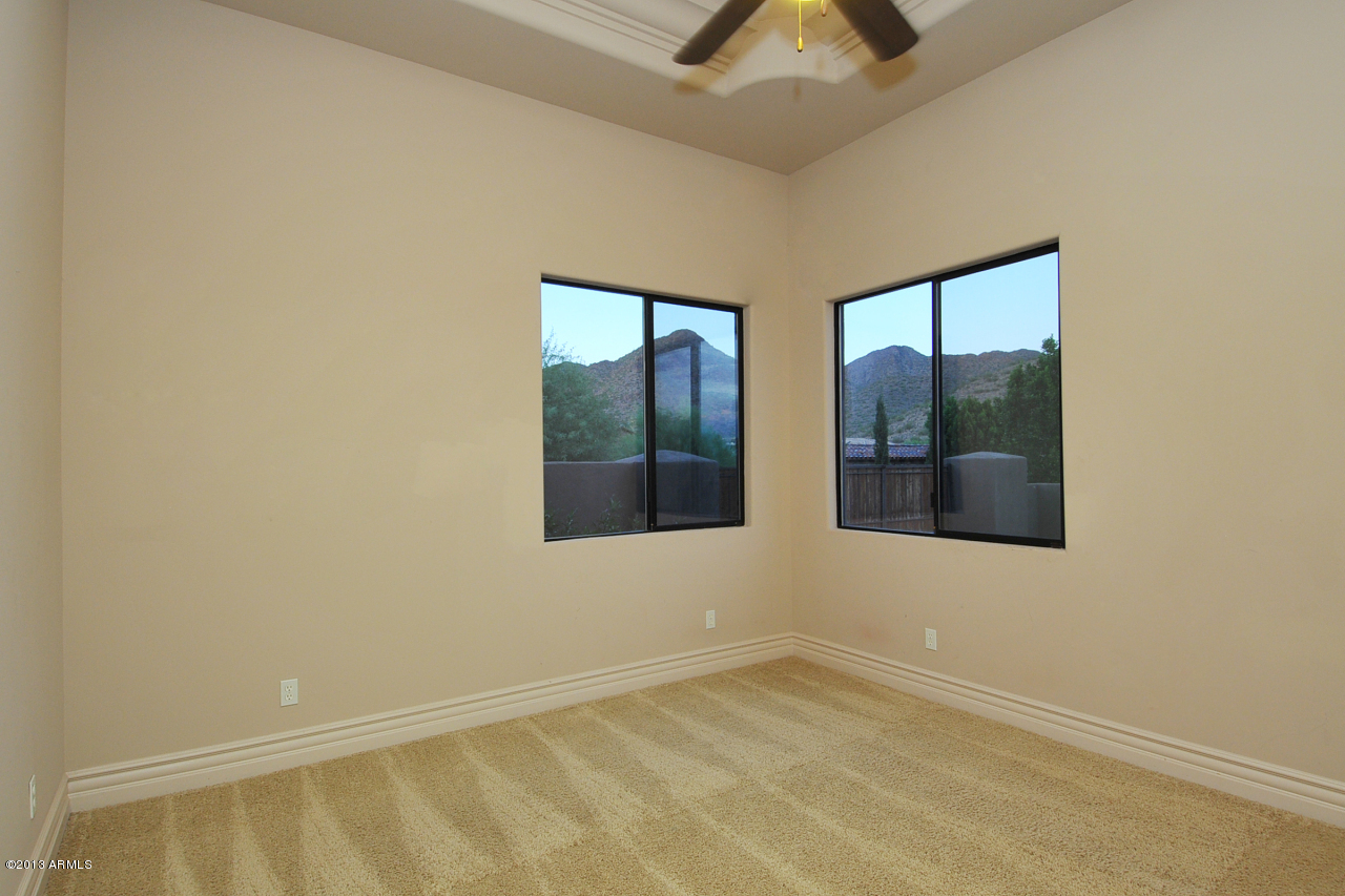 12827 East Cibola Road Scottsdale, AZ 85259 - Photo 38 of 64 an empty room with a window