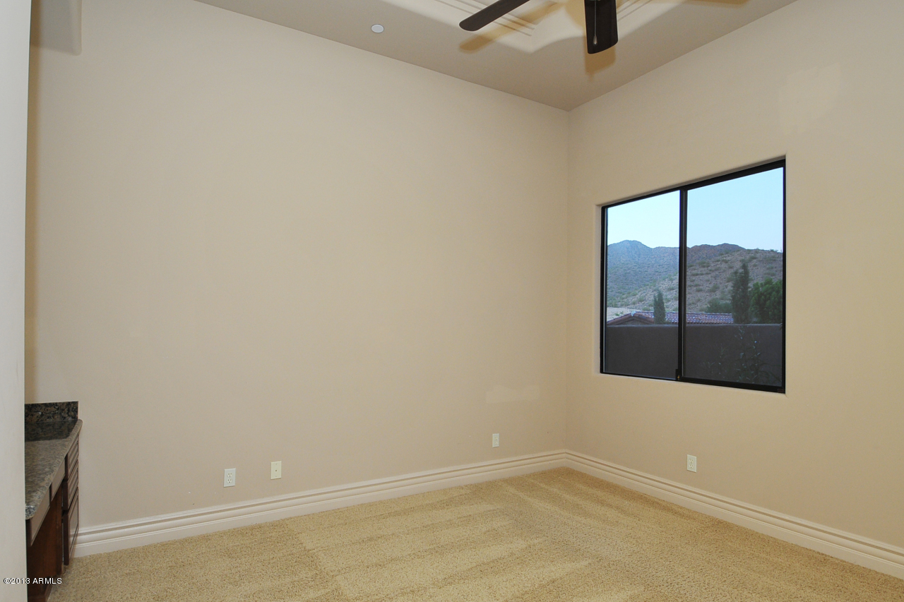 12827 East Cibola Road Scottsdale, AZ 85259 - Photo 41 of 64 a view of an empty room with a window
